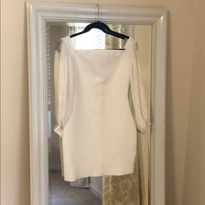Sheer sleeve white mini dress